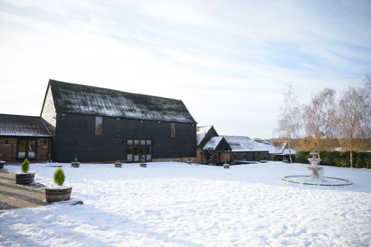 The baronial hall barn wedding venue in essex at winter