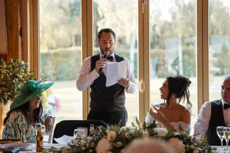 best man doing wedding speech